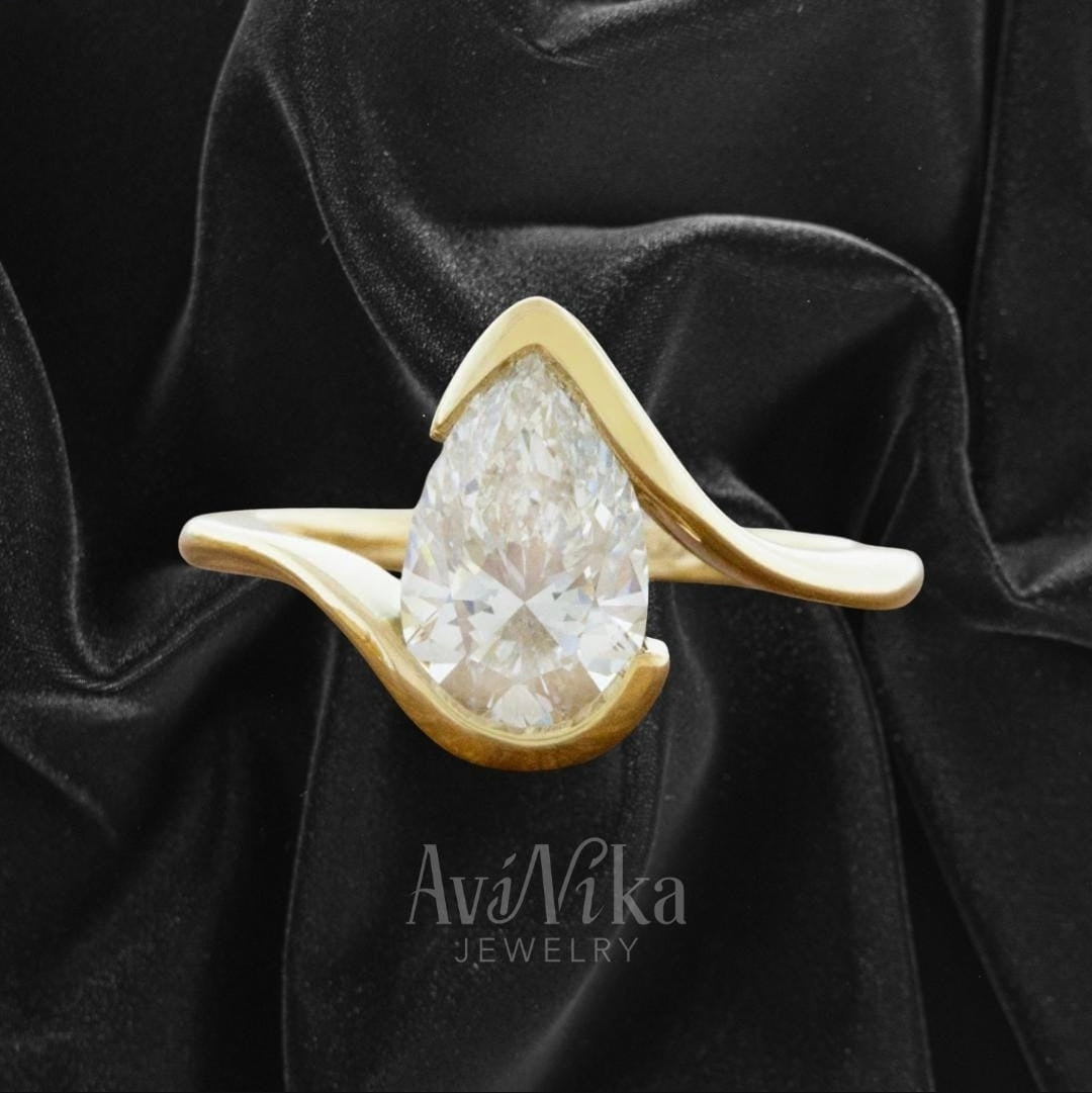 AviNika-Jewelry-Womans-Engagement-Ring-curved-bypass-bezel-14k-solid-gold-2-ct-pear-lab-diamond