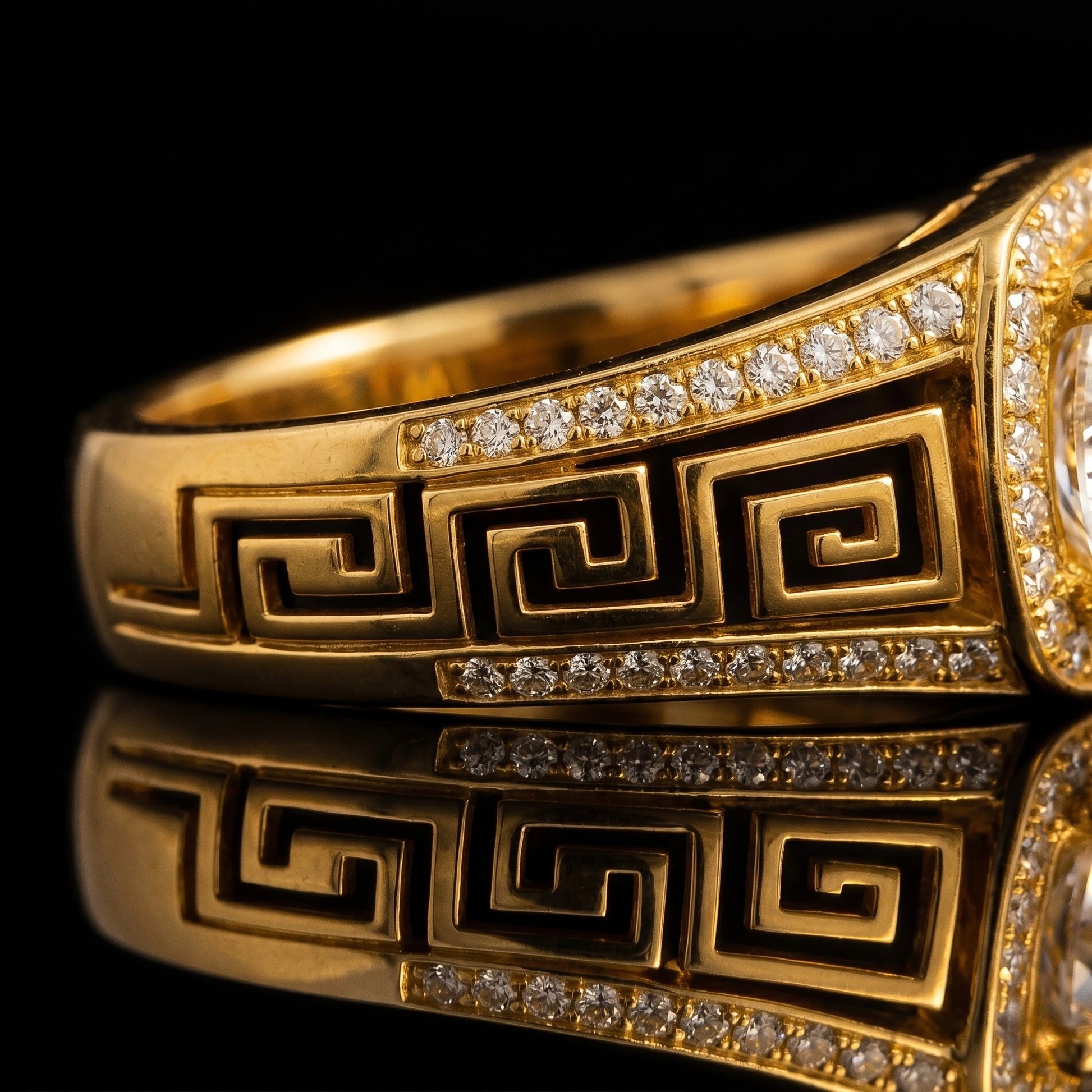 Men's 18K gold ring with Greek key meander engraving, round diamond halo center stone and pavé shoulders, handcrafted fine jewelry by AviNika