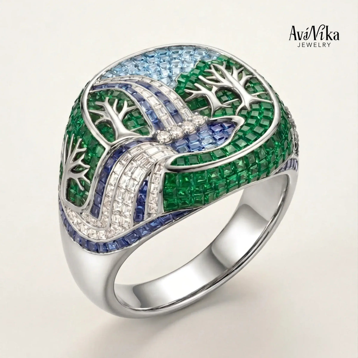 The Waterfall Ring with Emeralds & Blue Sapphires in platinum for him